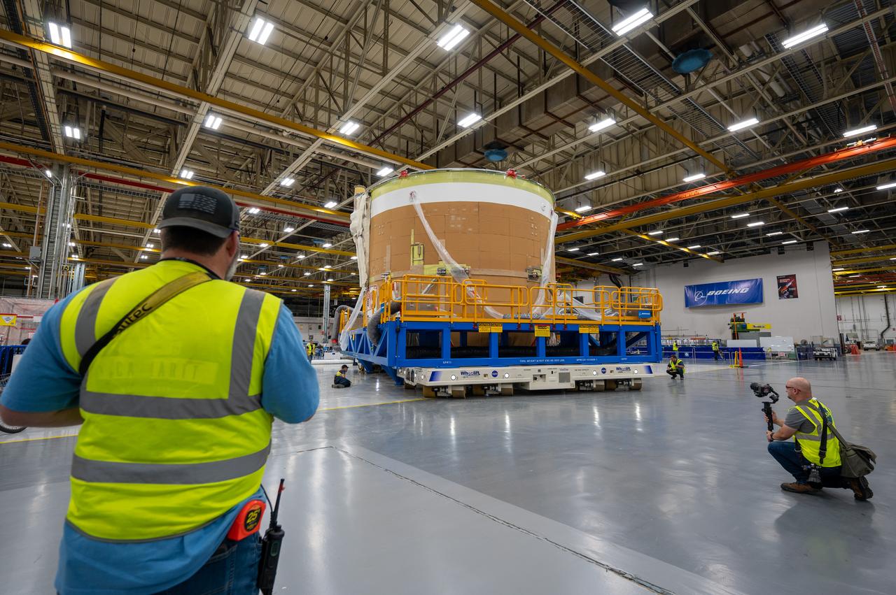 On May 24, 2022, the core stage production team moved the Space Launch System (SLS) rocket engine section for Artemis II to the core stage final integration area at NASA’s Michoud Assembly Facility in New Orleans.  While there, the engine section team is completing installation of the main propulsion systems, finishing integration of the electrical and avionics systems, and preparing for functional testing of the various systems. During final integration, the team also will install remaining internal thermal protection systems and prepare to position the engine section from vertical to horizontal so that it can be joined with the rest of the core stage. The engine section is located at the bottom of the core stage and includes the rocket’s main propulsion systems that connect to the core stage’s four RS-25 engines that will help launch the Artemis II lunar mission. This fall, the engine section will be horizontally integrated with the previously-joined forward assembly and liquid hydrogen tank to complete the core stage. NASA and core stage lead contractor Boeing are building core stages for the next three Artemis missions.  The 212-foot core stage with its RS-25 engines will provide more than 2 million pounds of thrust at launch. With Artemis, NASA will land the first woman and the first person of color on the Moon and establish long-term exploration in preparation for missions to Mars. SLS and NASA’s Orion spacecraft, along with the commercial human landing system and the Gateway in orbit around the Moon, are NASA’s backbone for deep space exploration. SLS is the only rocket that can send Orion, astronauts, and supplies to the Moon in a single mission.  